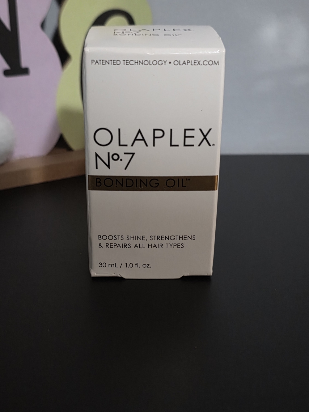 OLAPLEX No.7 Bonding Oil - White & Gold Accents